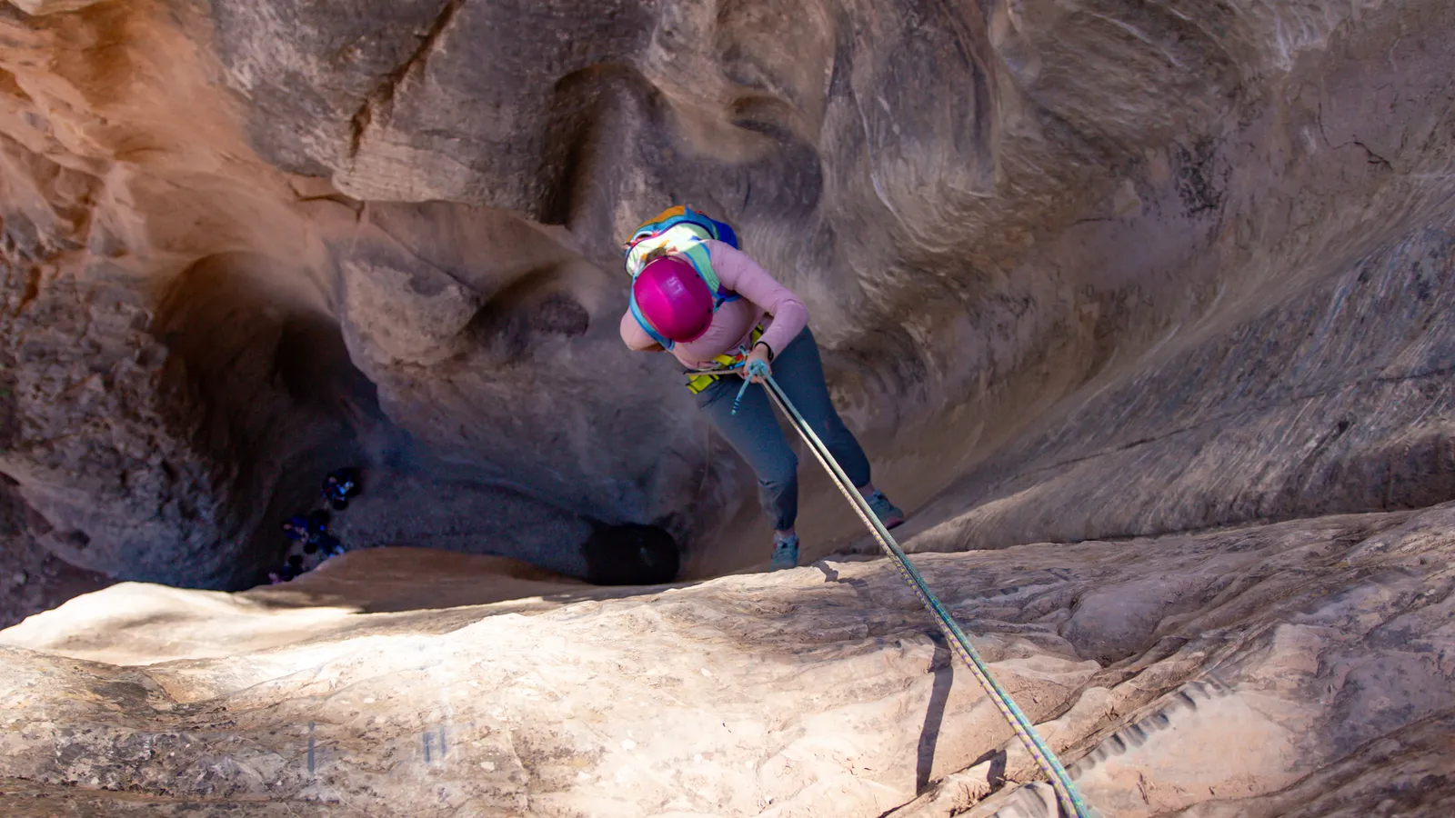 Rappelling into a Utah slot canyon