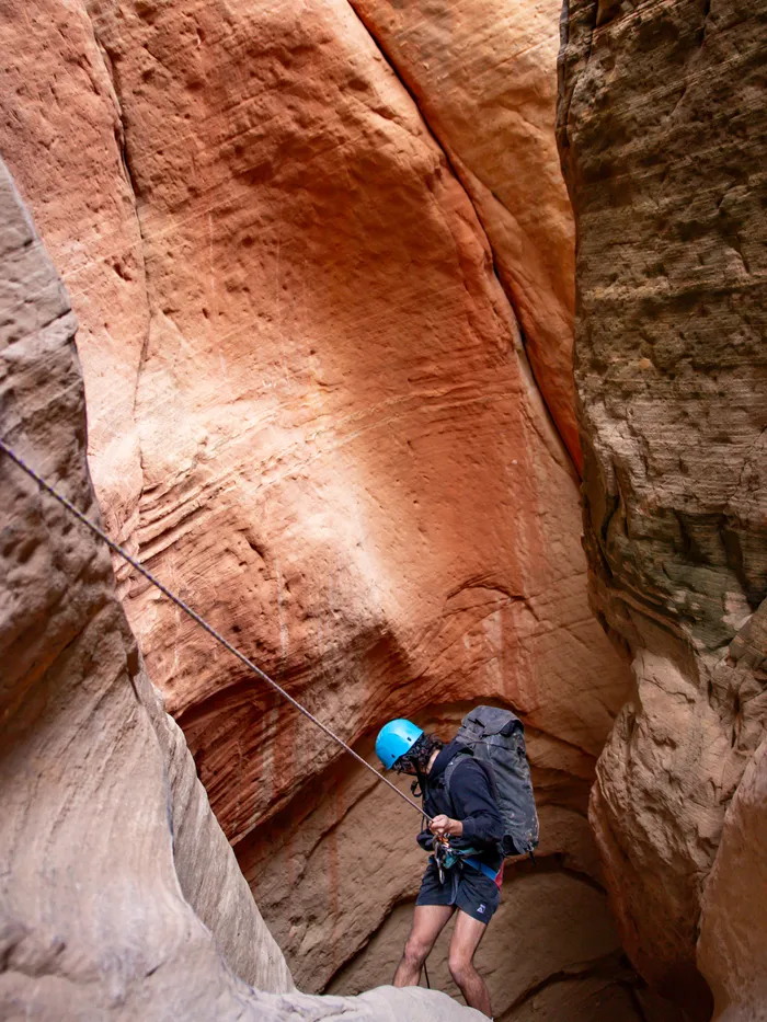 Rappelling in a Utah slot canyon