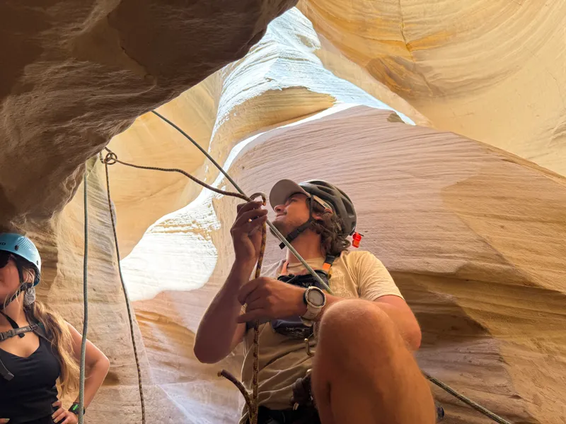 Rappelling in Utah canyon